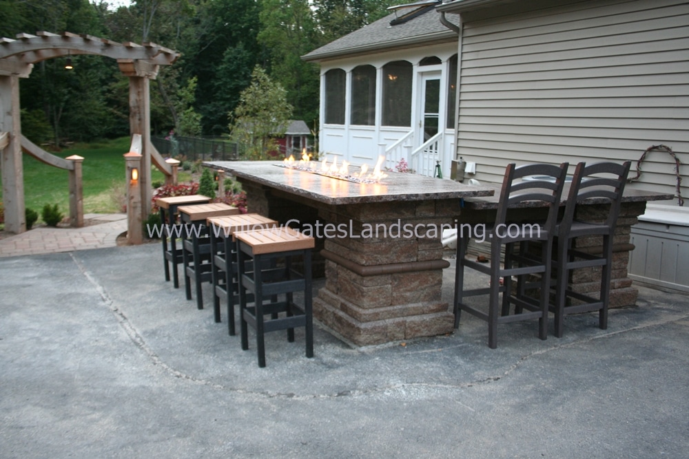 An Outdoor Fire Table installed by Willow Gates Landscaping